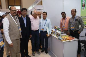 Shri H. S. Vyas along with other delegates visiting stalls